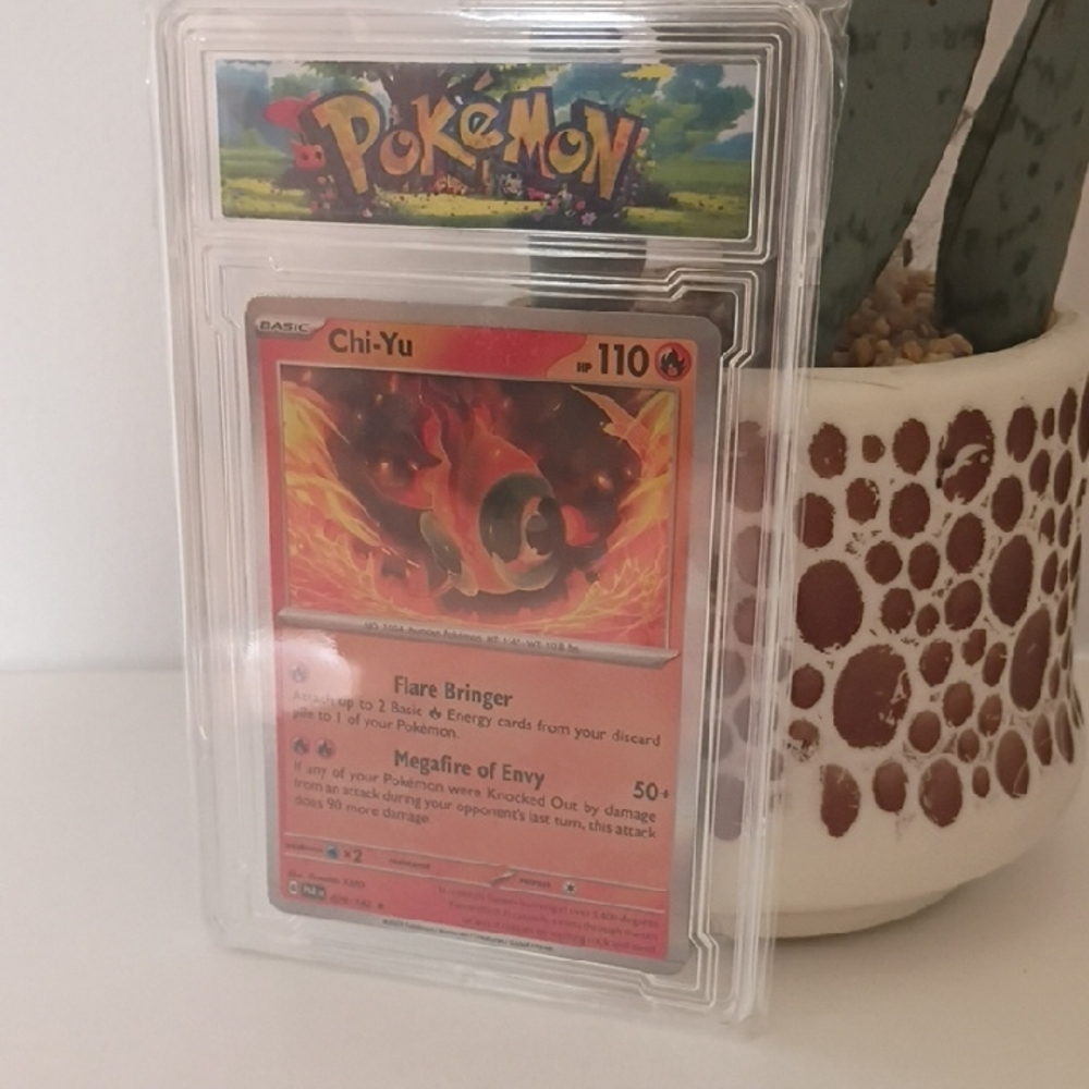 Pokémon Chi-Yu Holo Card (Encased) - Red/Orange